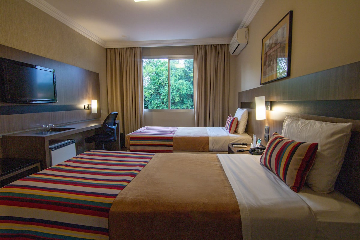 superior twin room | minibar, in-room safe, desk, laptop workspace