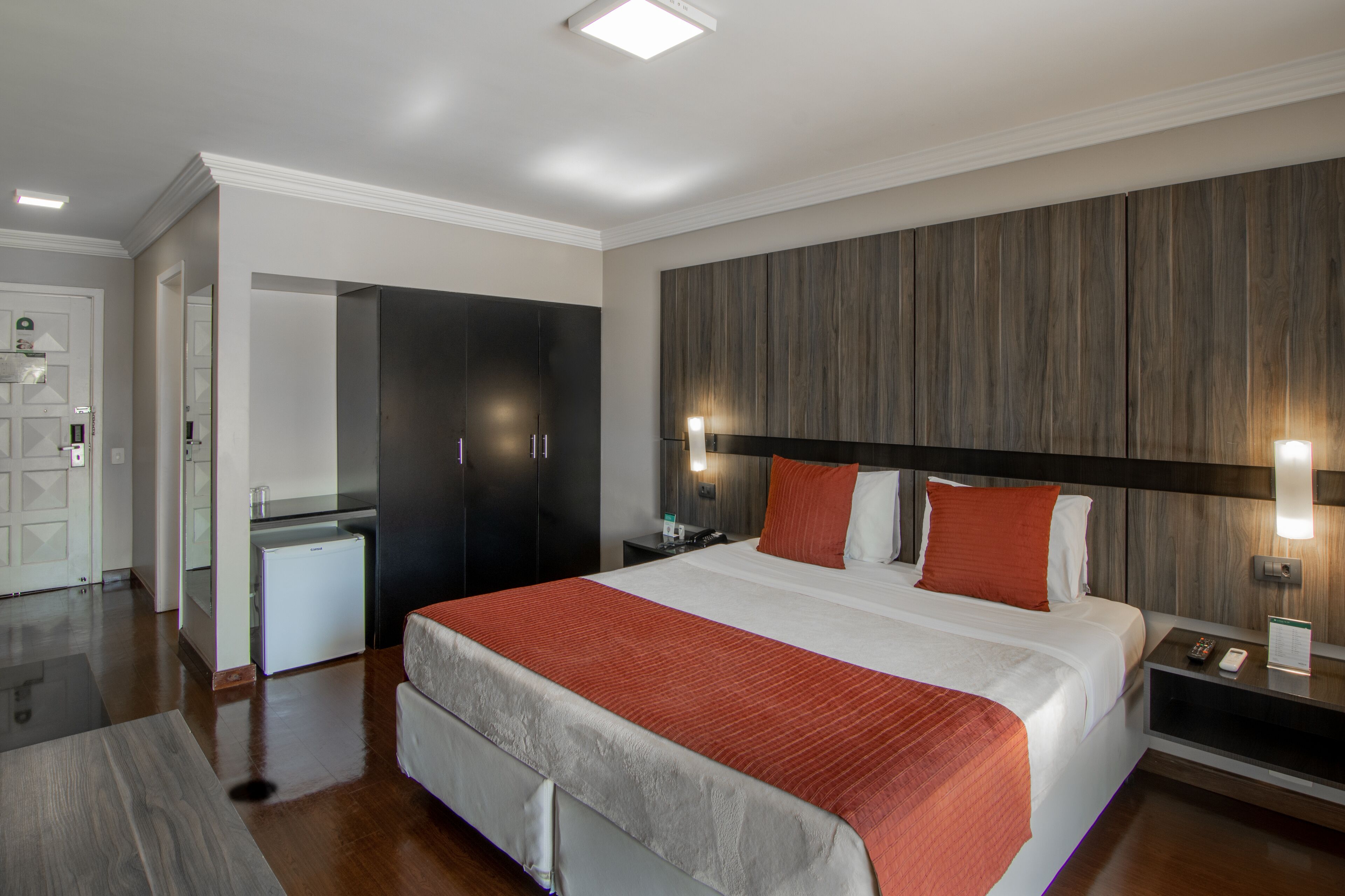 deluxe double room | minibar, in-room safe, desk, laptop workspace