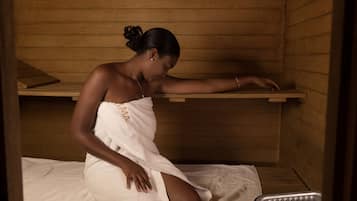 Relax in a serene sauna with a single bench for a peaceful retreat.