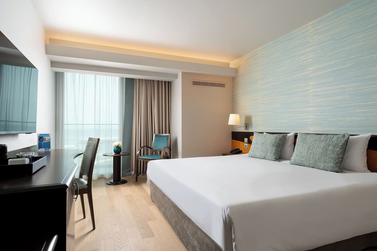 Standaard kamer, 1 twee- of 2 eenpersoonsbedden | Luxe beddengoed, een minibar, een kluis op de kamer, een bureau