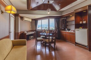 Suite, 1 Bedroom | Living room | 32-inch LCD TV with satellite channels - Holiday Garden Hotel & Resort Chiang Mai (Chiang Mai)