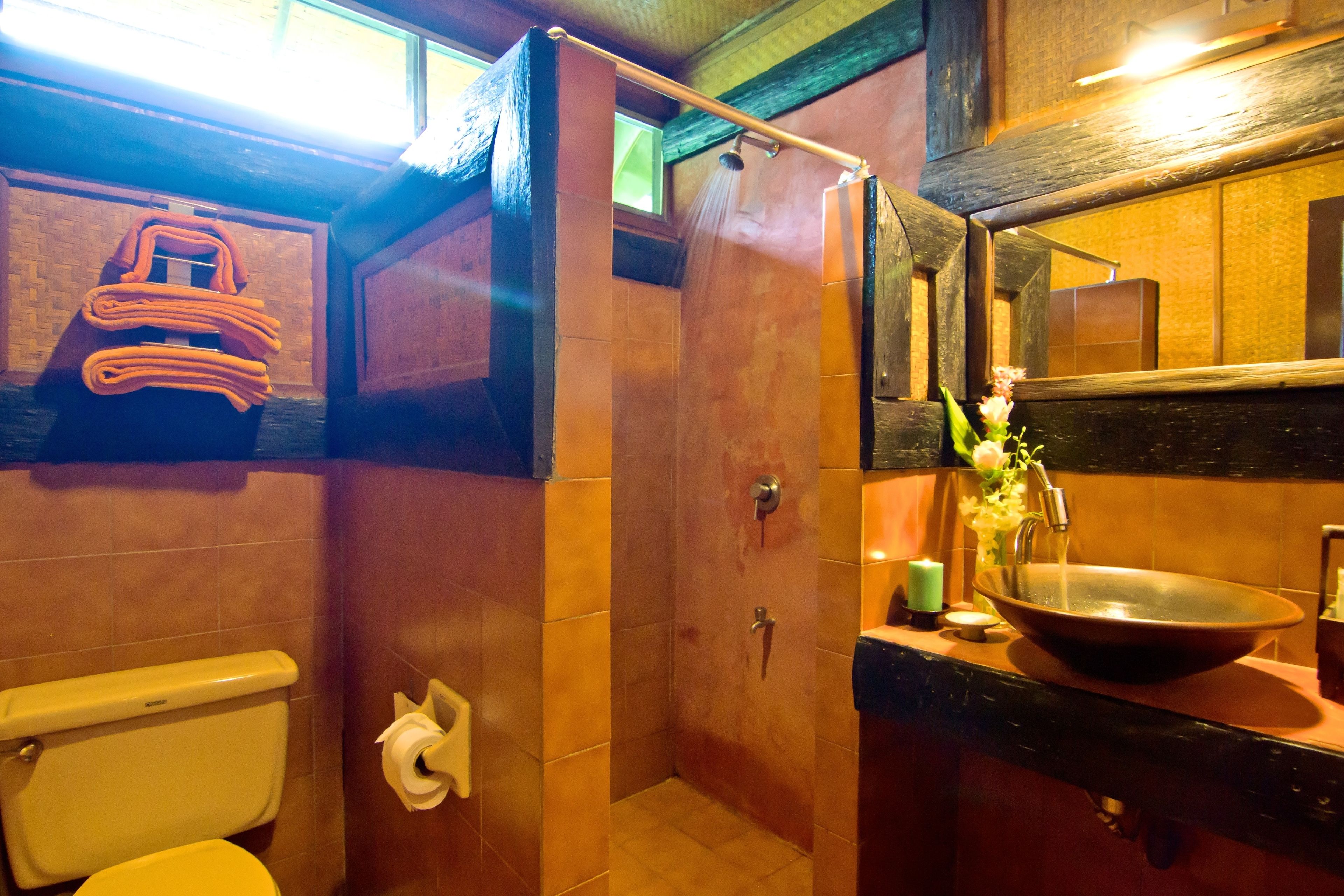 standard twin room | bathroom | shower, eco-friendly toiletries, hair dryer, slippers