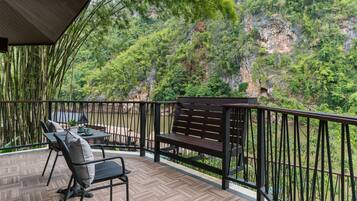 Deluxe Room, River View | Terrace/patio