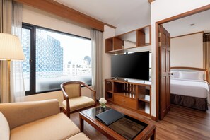Junior Suite, 1 Bedroom Smoking | Living area | 32-inch LCD TV with cable channels, TV, pay movies - Grand Diamond Suite (Bangkok)