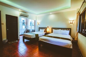 Family Triple Room, 1 Bedroom, Courtyard Area | Desk, blackout curtains, rollaway beds, free WiFi