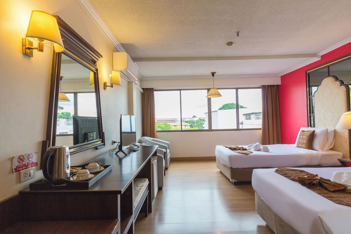 Deluxe Room | Premium bedding, in-room safe, desk, blackout drapes