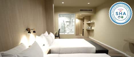 Habitación ejecutiva con 1 cama doble o 2 individuales, 2 camas de matrimonio | 1 dormitorio, caja fuerte, escritorio y wifi