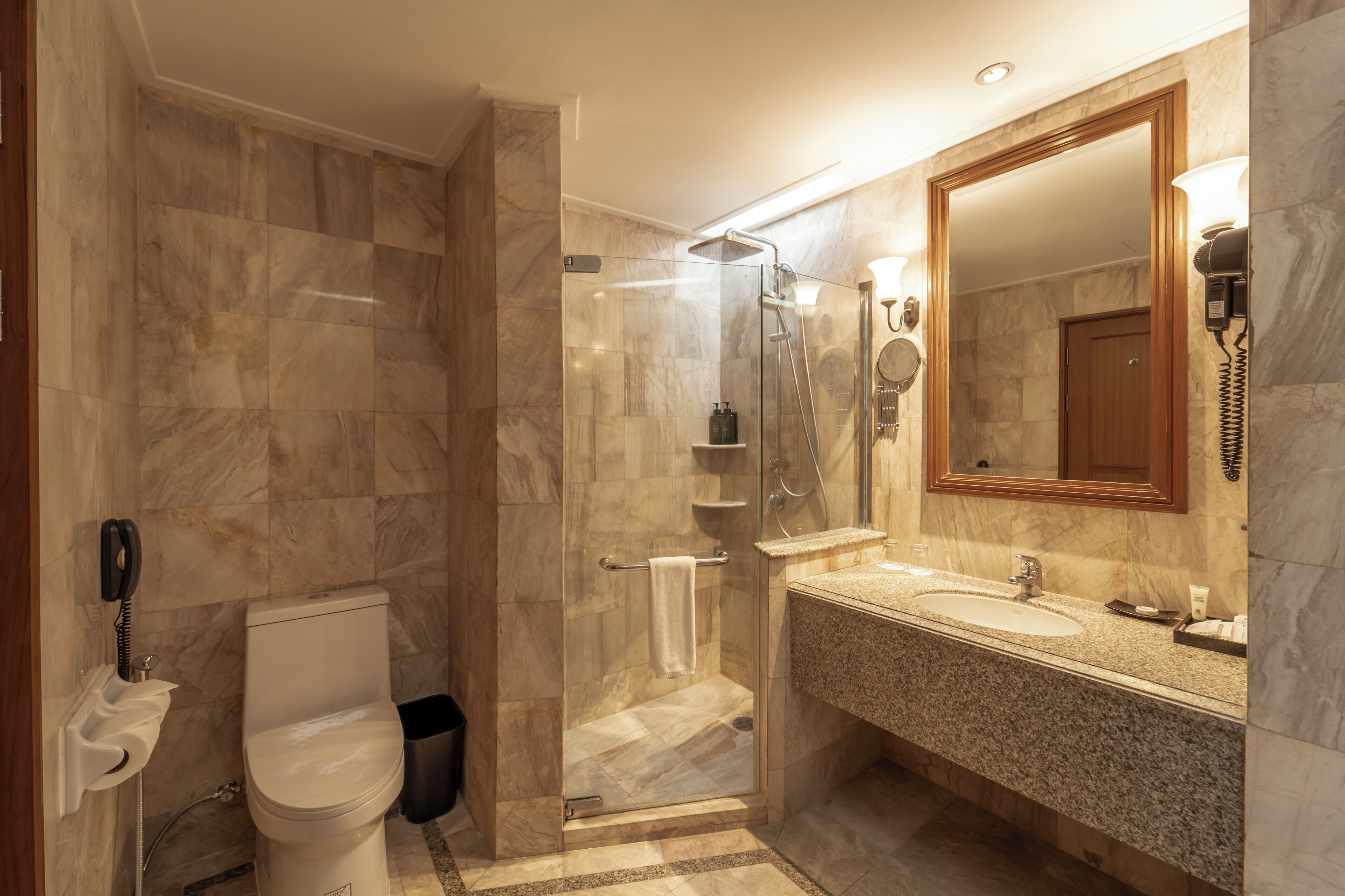sky view premier room | bathroom | separate bathtub and shower, deep-soaking bathtub, hair dryer, towels