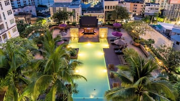 Outdoor pool, open 7:00 AM to 9:00 PM, pool umbrellas, pool loungers