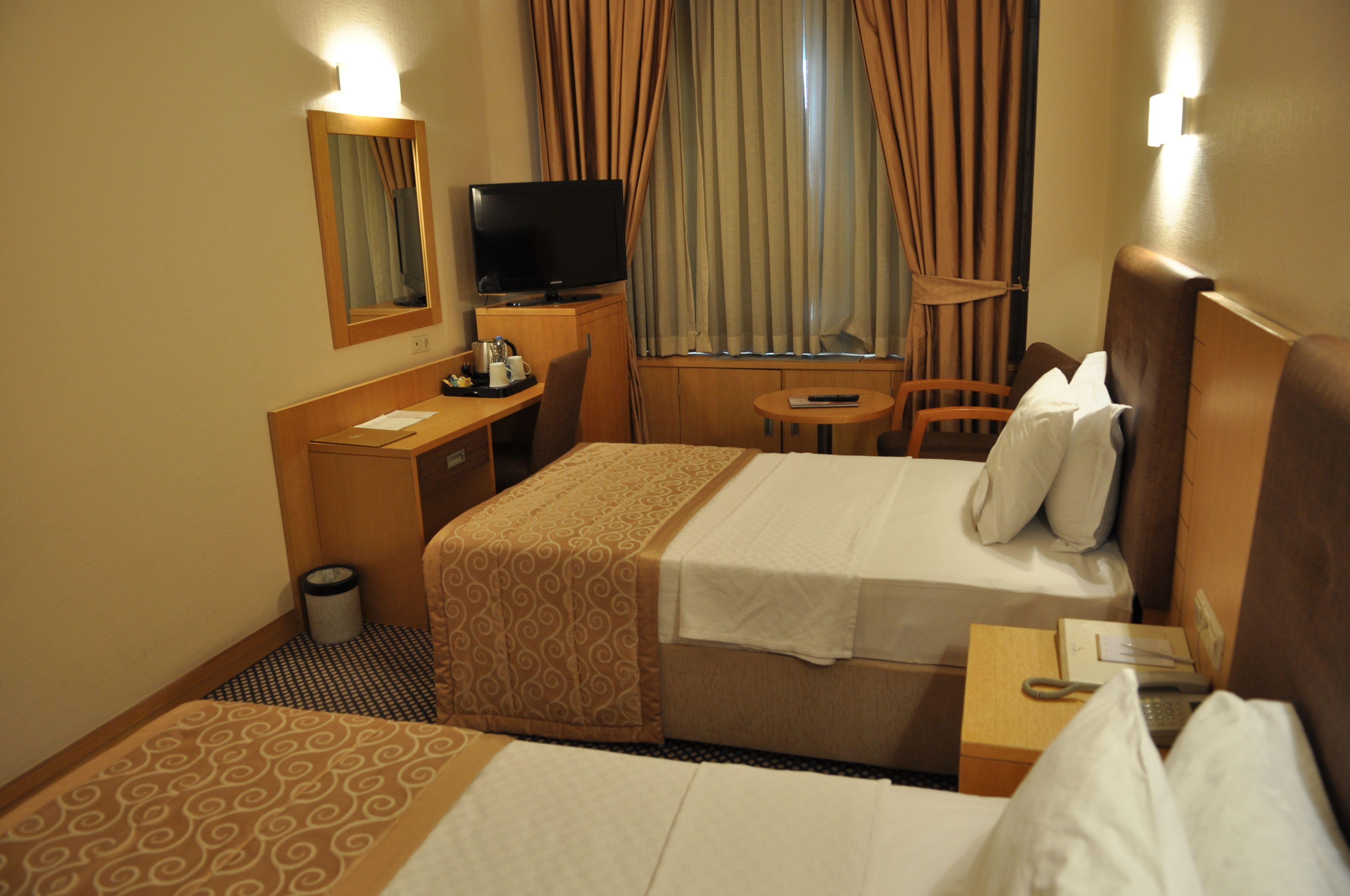 superior room, multiple beds | free minibar items, in-room safe, desk, blackout curtains