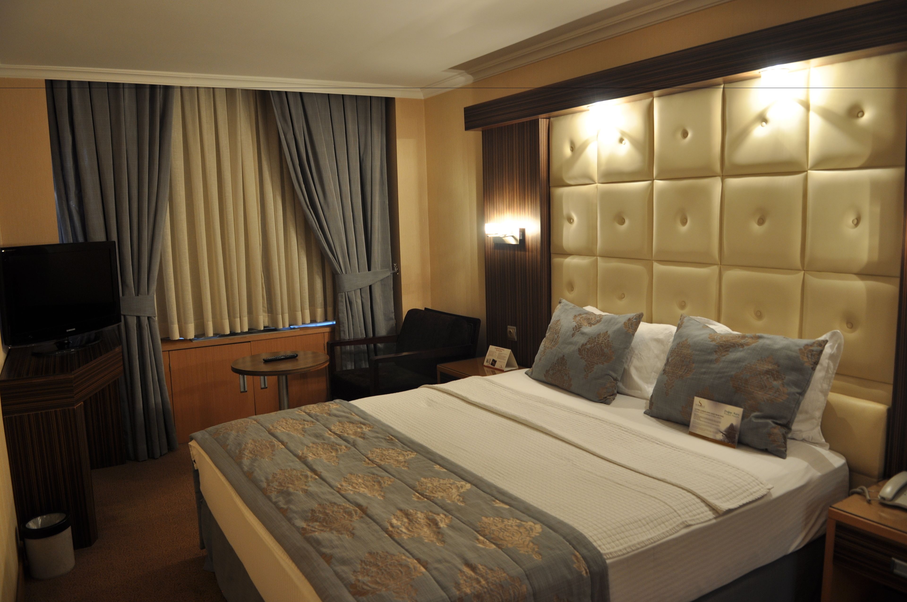 superior room, multiple beds | free minibar items, in-room safe, desk, blackout curtains