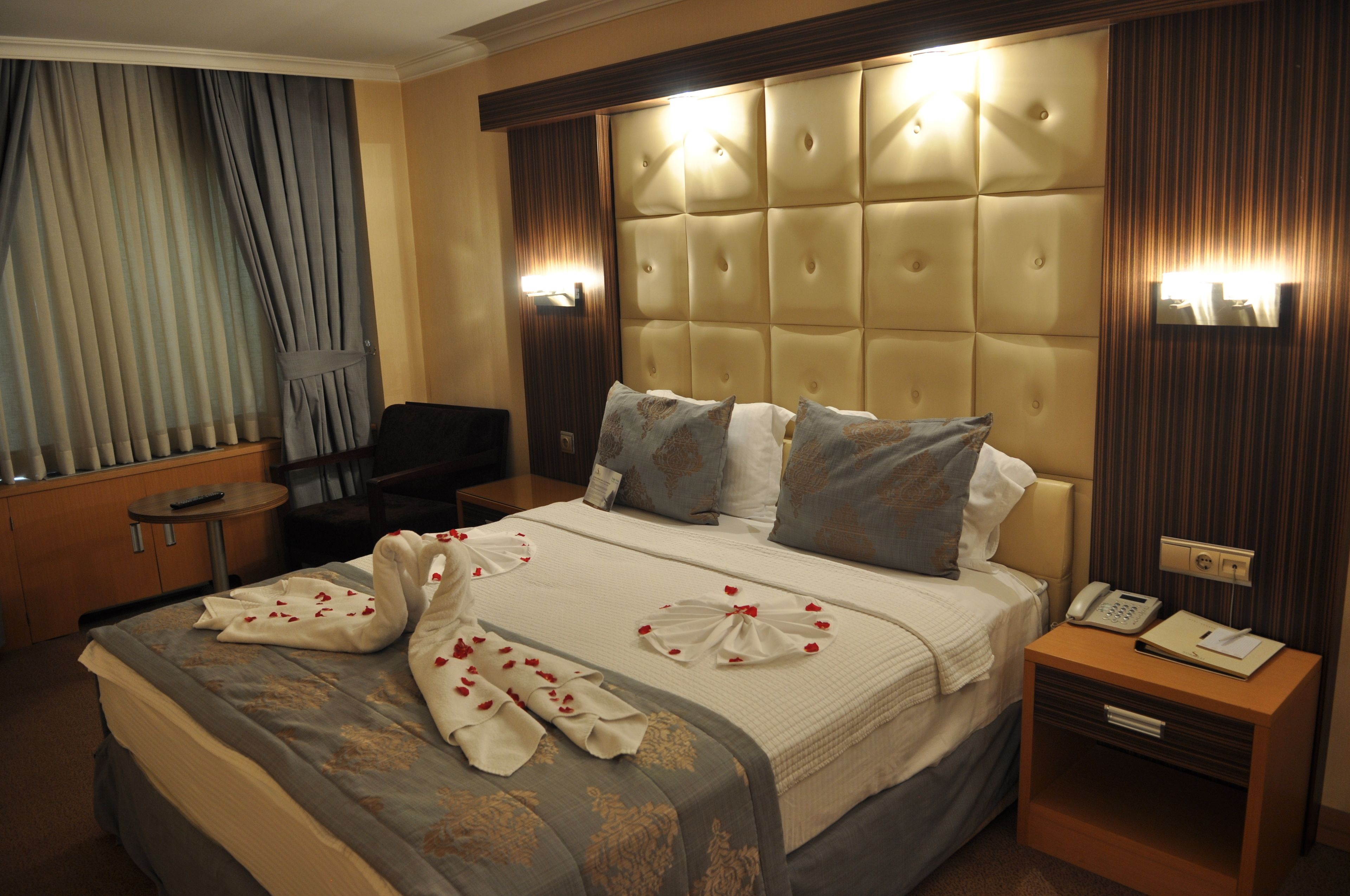 superior room, multiple beds | free minibar items, in-room safe, desk, blackout curtains