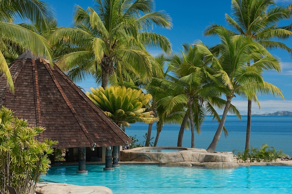 Outdoor pool, pool umbrellas, sun loungers