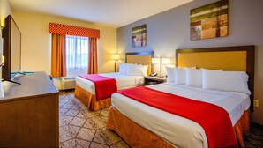 A hotel room with two beds, a desk, a chair, and a window with curtains. - Best Western Nittany Inn Milroy (Reedsville)