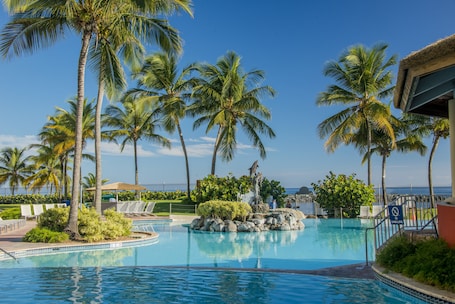 Outdoor pool, open 7 AM to 9:00 PM, pool umbrellas, sun loungers