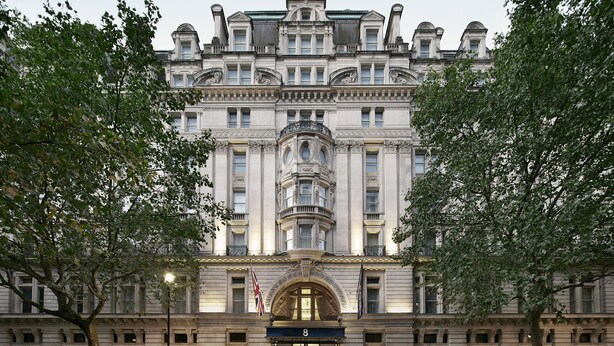 A grand, historic building with a symmetrical facade, large windows, and a prominent entrance. - The Grand at Trafalgar Square (London)
