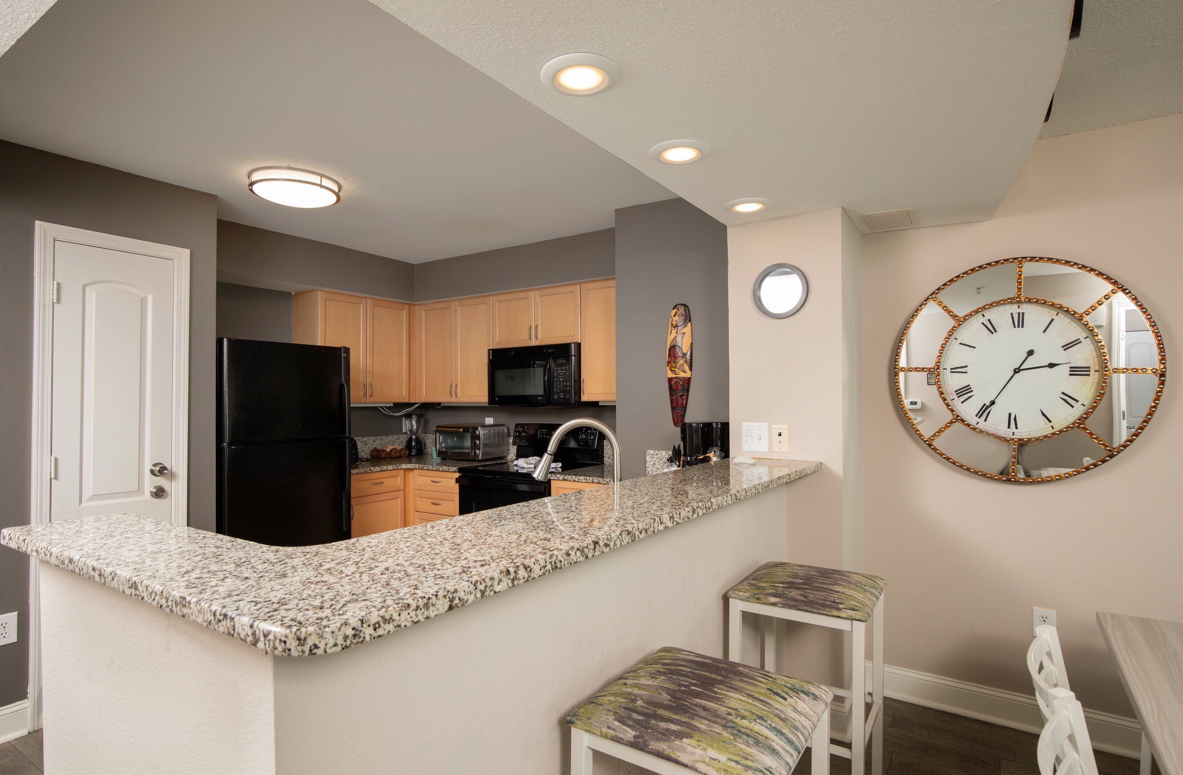 standard condo, 3 bedrooms, partial ocean view | private kitchen | full-sized fridge, microwave, oven, stovetop