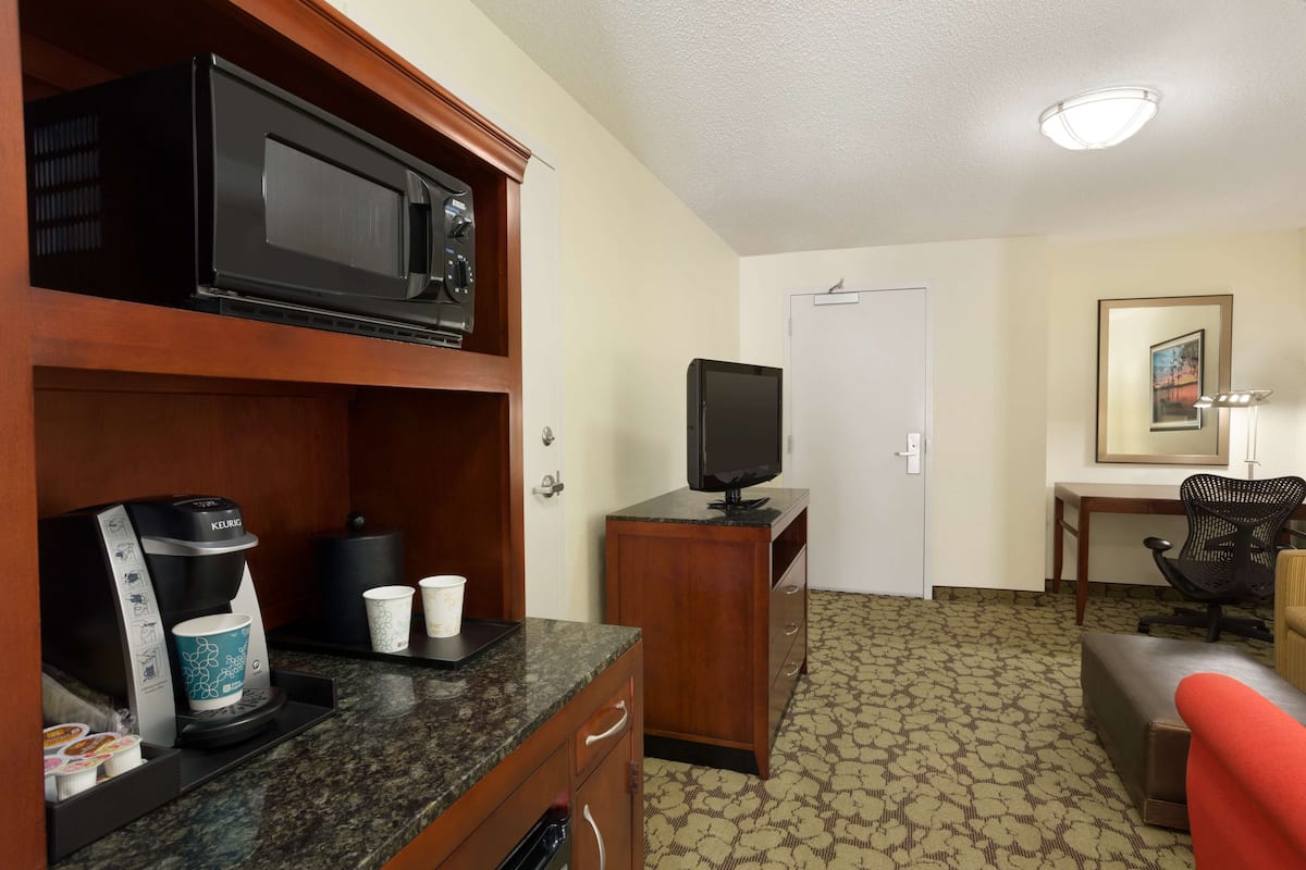 One King Junior Suite | In-room safe, desk, blackout curtains, iron/ironing board