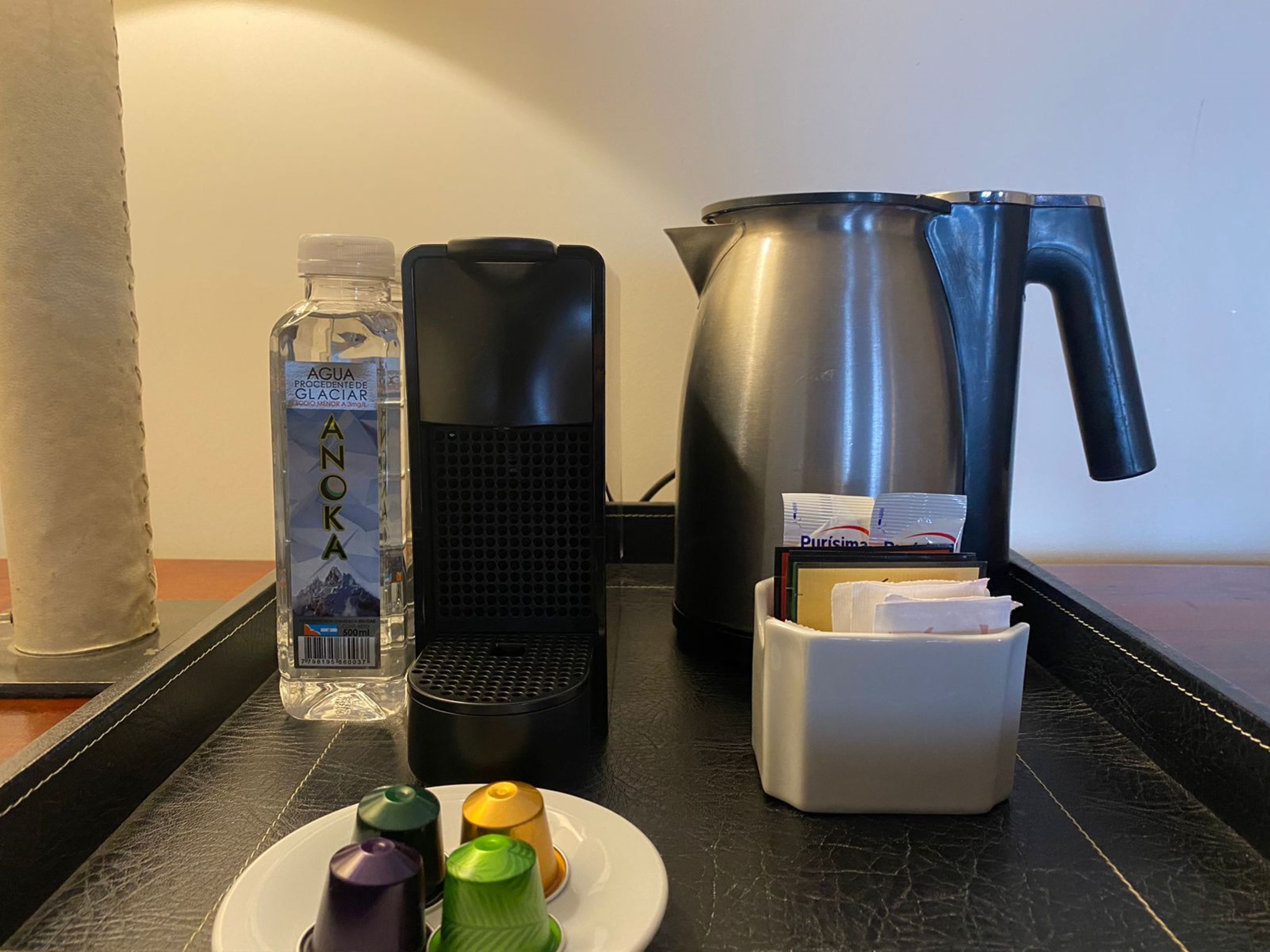 senior suite, 1 queen bed, canal view | coffee and/or coffee maker