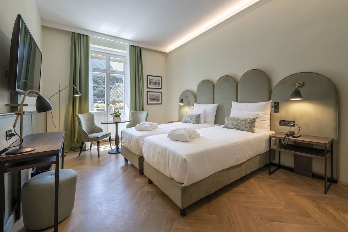 deluxe room | premium bedding, down duvets, select comfort beds, minibar
