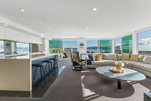 Penthouse, 4 Bedrooms, Lake View | Living area | 50-cm flat-screen TV with satellite channels, TV