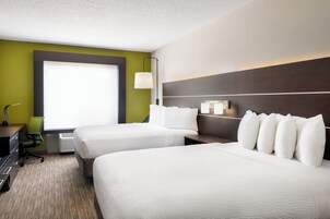 Blackout drapes, iron/ironing board, free cribs/infant beds, free WiFi