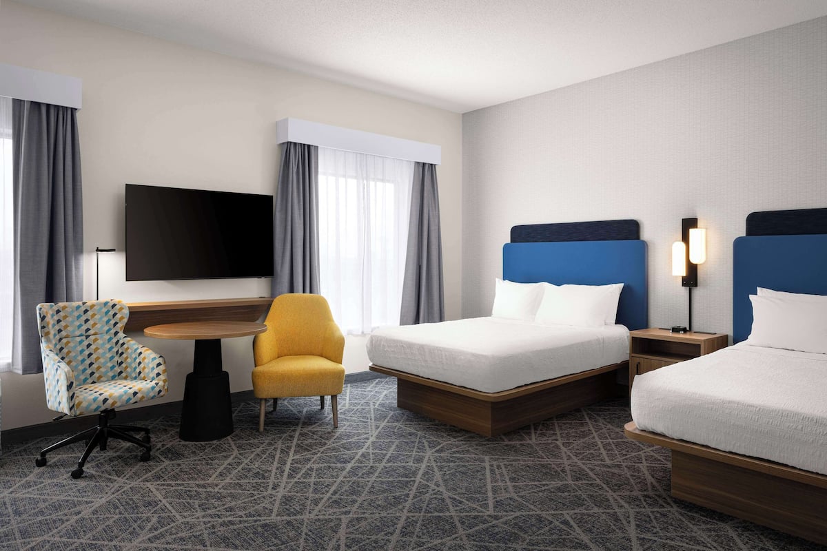 Suite, 2 Queen Beds, Non Smoking | Iron/ironing board, cribs (free), rollaway beds (free), WiFi (free)