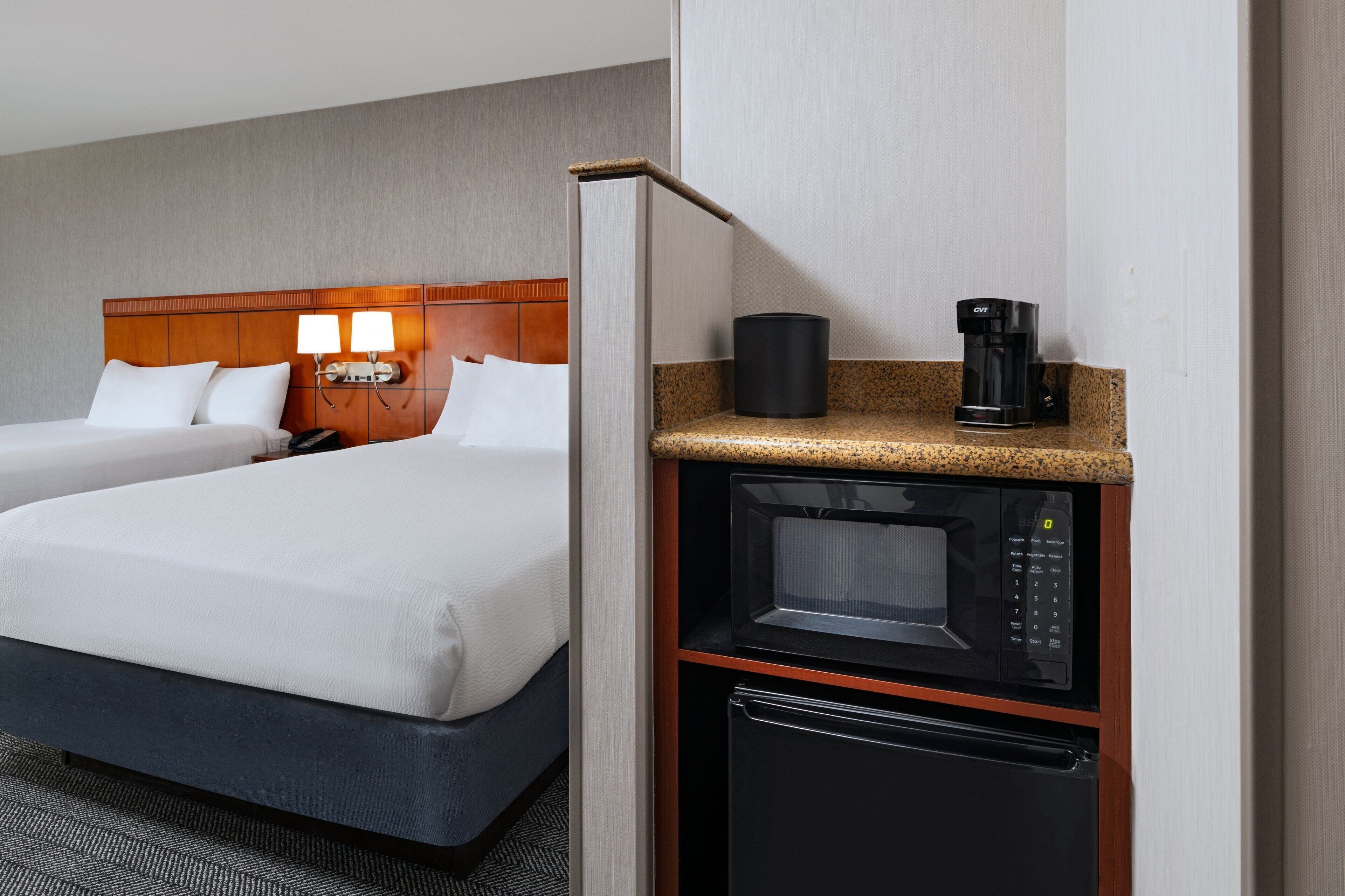 room, 2 queen beds, non smoking | premium bedding, individually decorated, individually furnished, desk