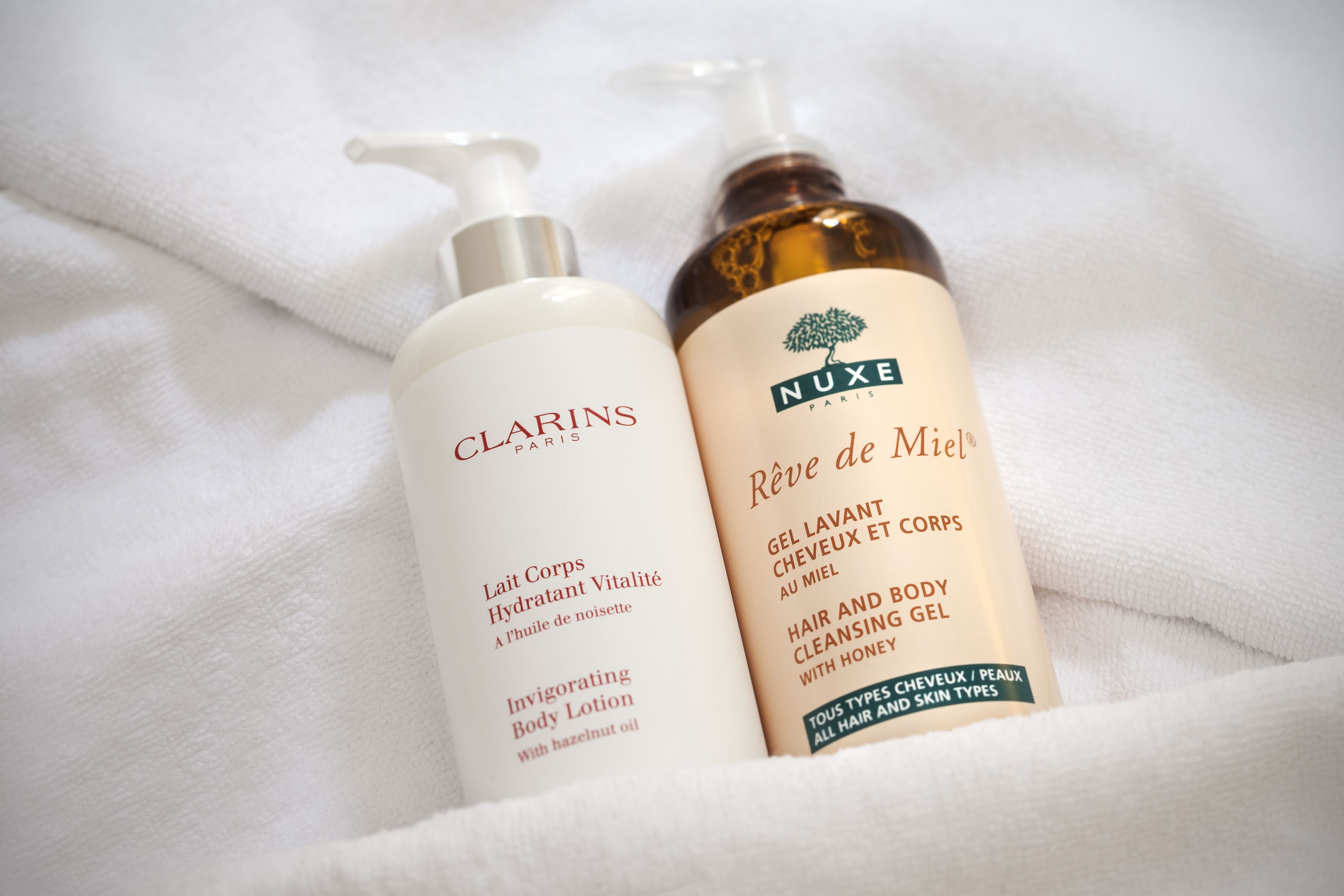 shower, designer toiletries, hair dryer, towels