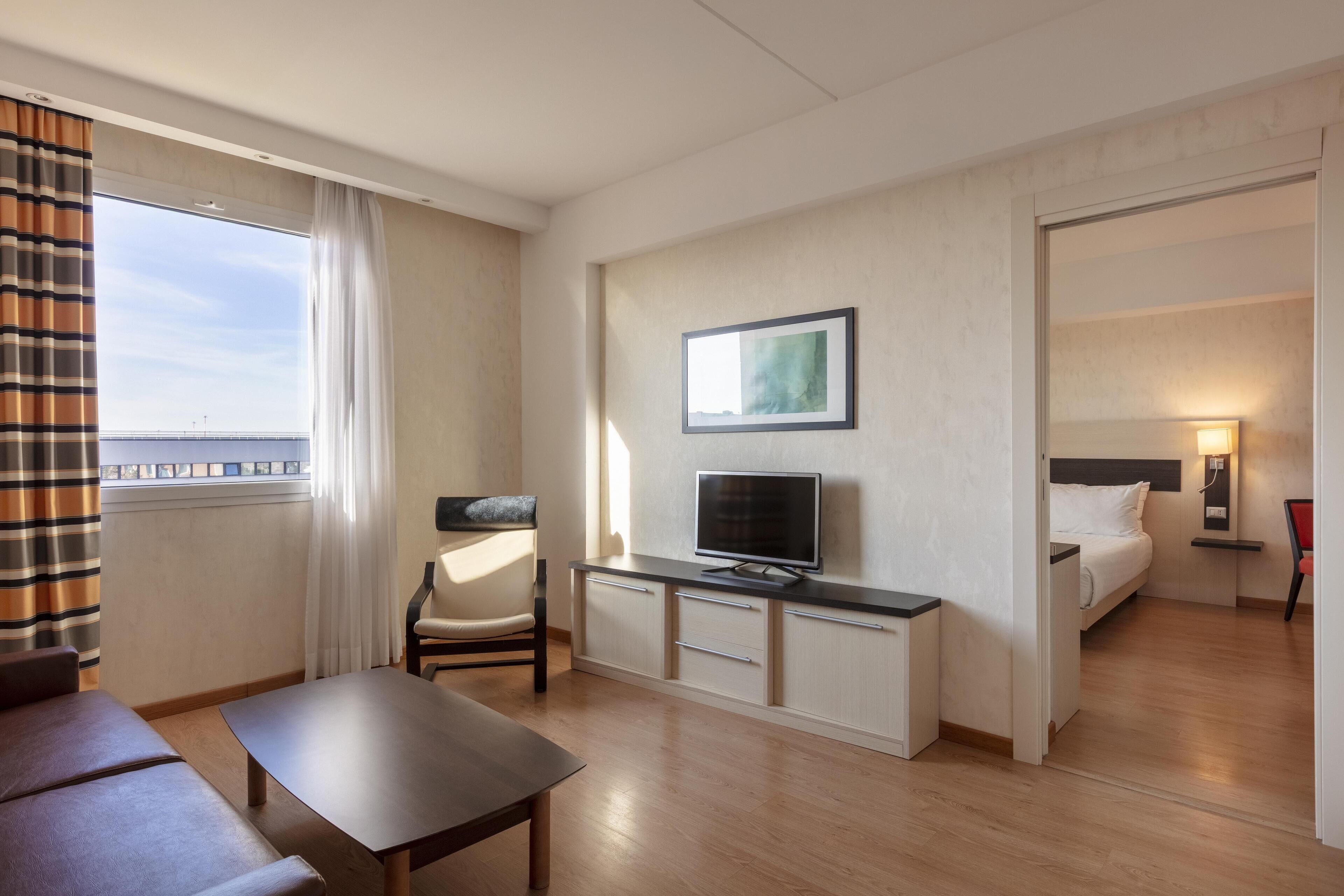 Family Room, 1 King Bed | Living area | 32-inch LCD TV with digital channels