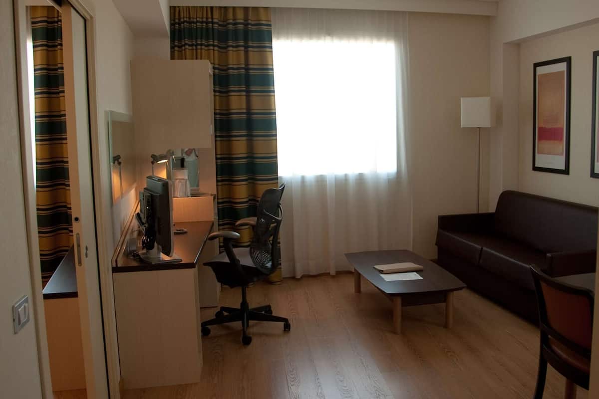 family room, 1 king bed | select comfort beds, in-room safe, desk, blackout curtains