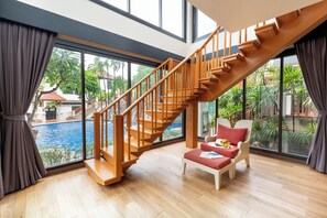 Two Bedrooms Duplex Pool Side | Living area | TV - The Briza Beach Resort, Samui (Koh Samui)