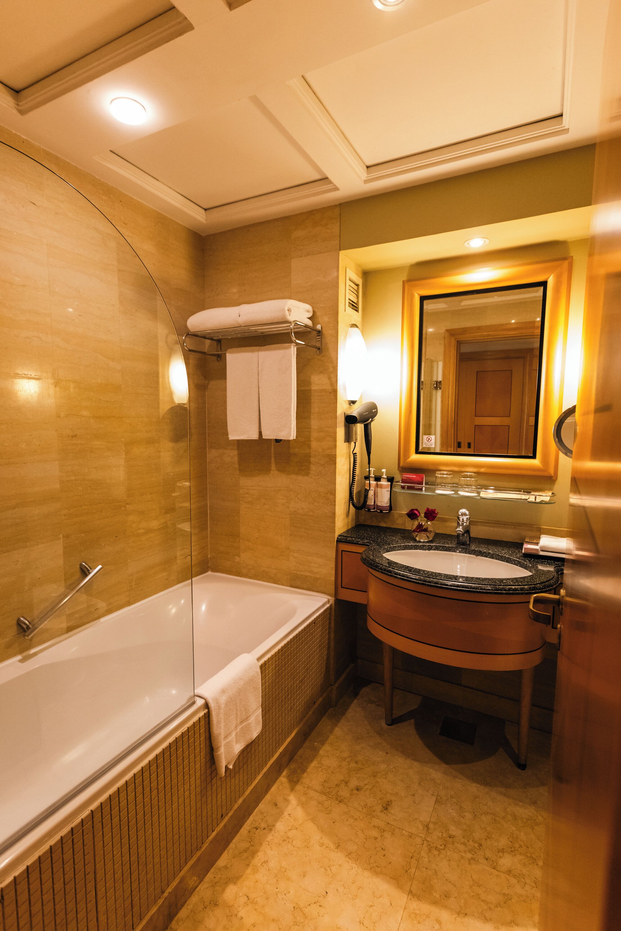 Bathtub, eco-friendly toiletries, hair dryer, bathrobes