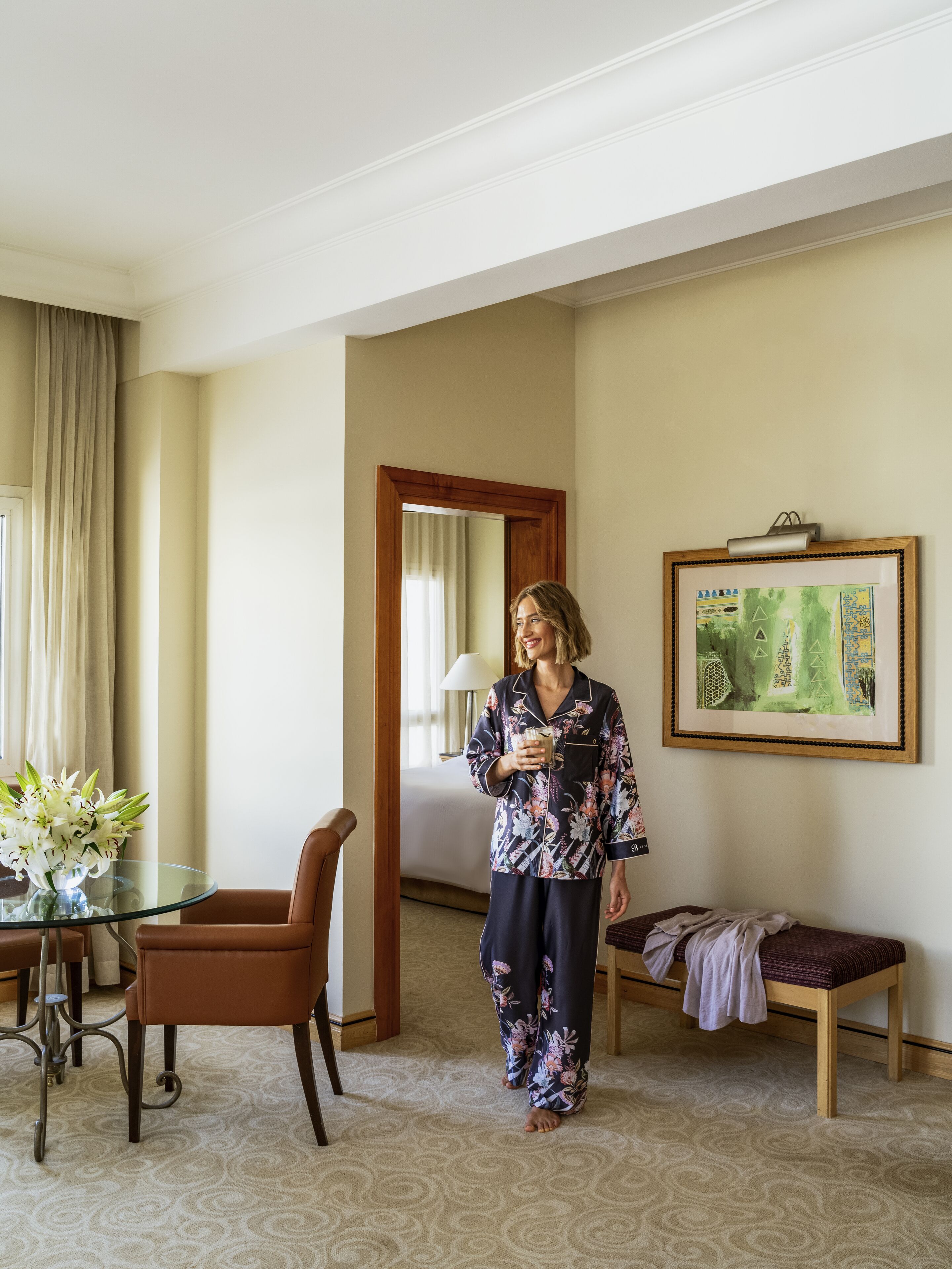 business suite, 1 king bed | living area | 55-inch smart tv with digital channels, tv