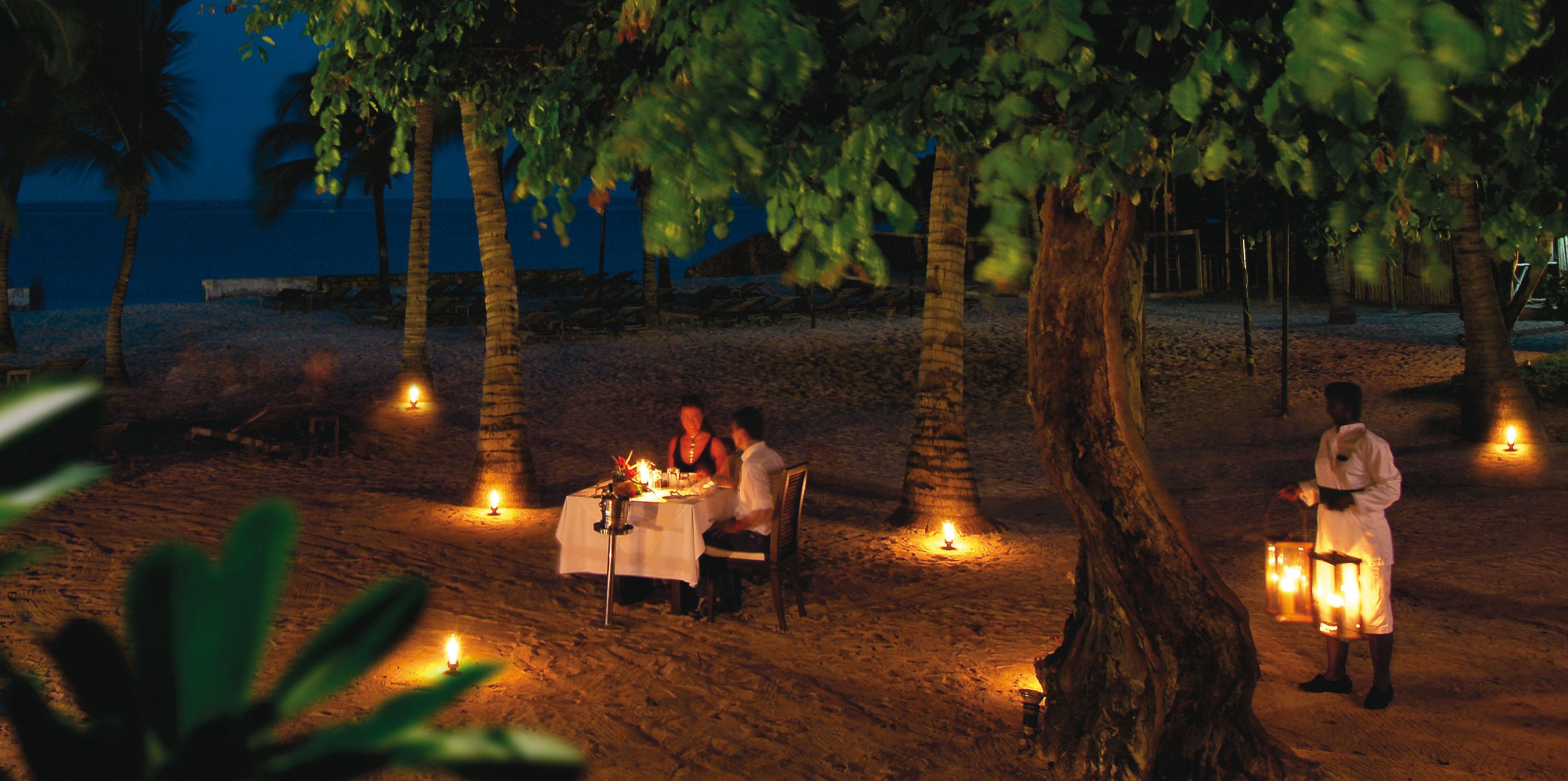 on the beach, white sand, sun-loungers, beach umbrellas