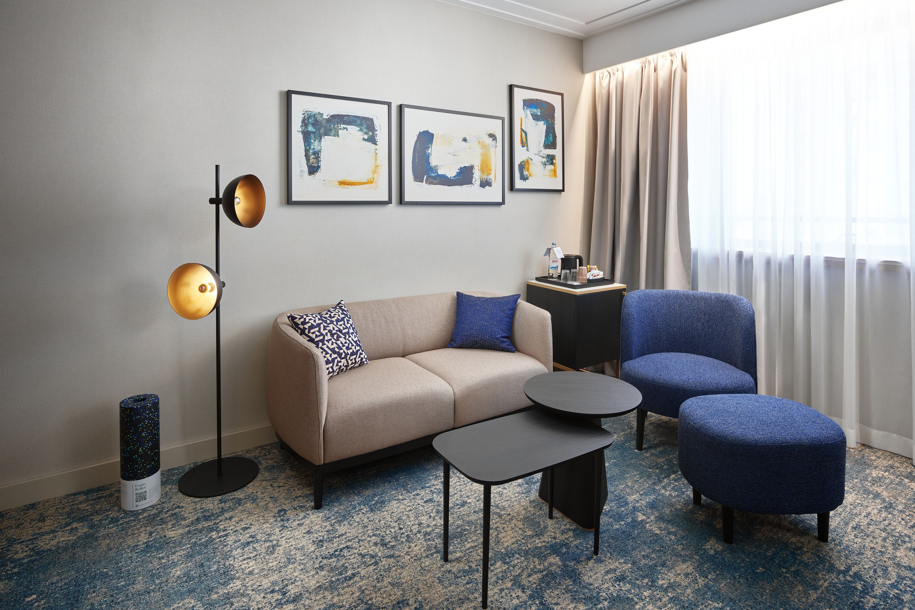 deluxe room with sofa bed | living area | 82-cm lcd tv with satellite channels, tv, pay films