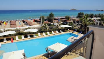 Outdoor pool, pool umbrellas, pool loungers