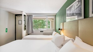 Premium bedding, desk, laptop workspace, blackout curtains