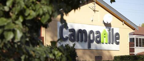 A building with a sign that reads "Campanile."