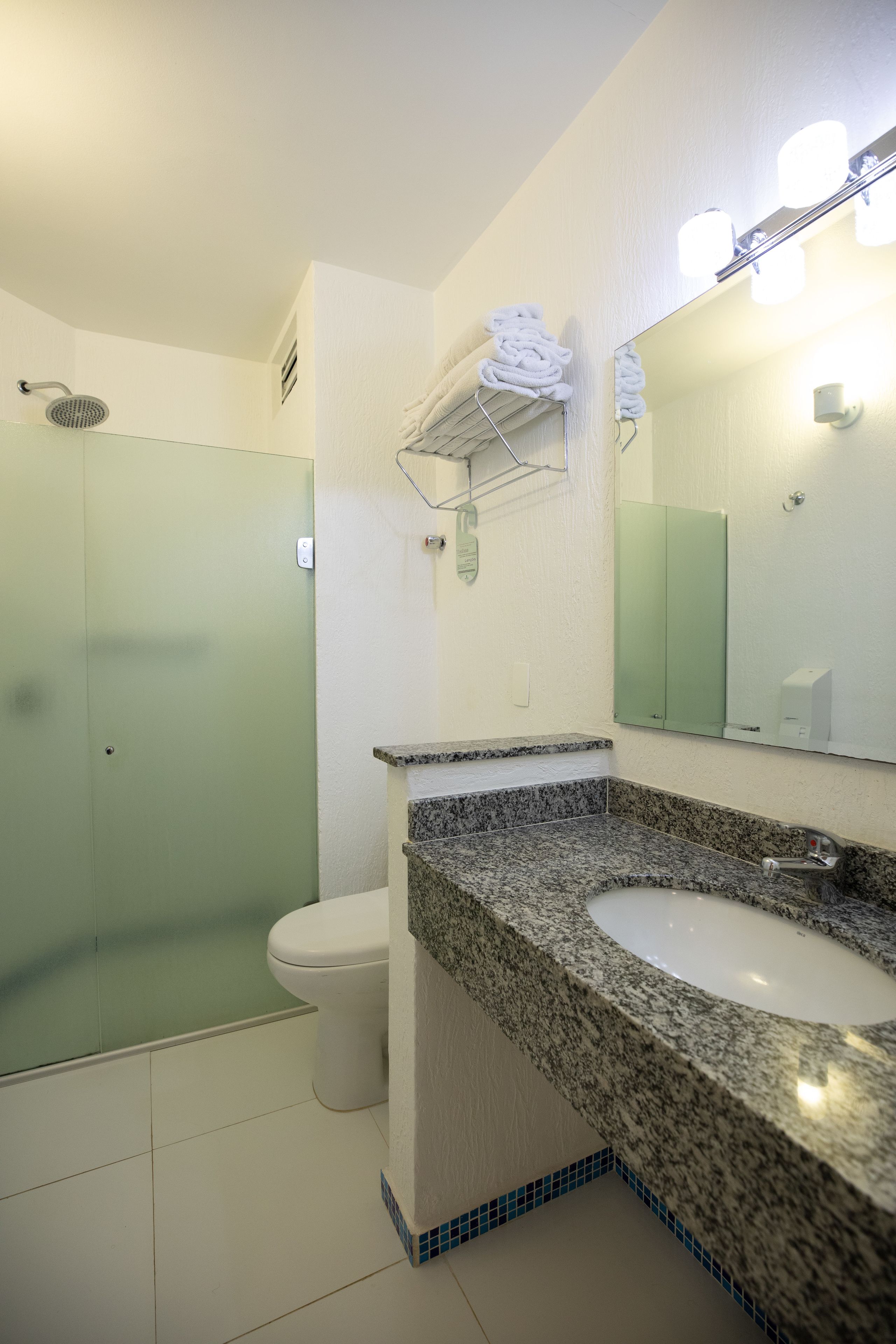 deluxe double room | bathroom | shower, hair dryer, towels, soap