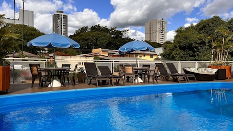 2 outdoor pools, open 8:00 AM to 11:00 PM, pool umbrellas, sun loungers