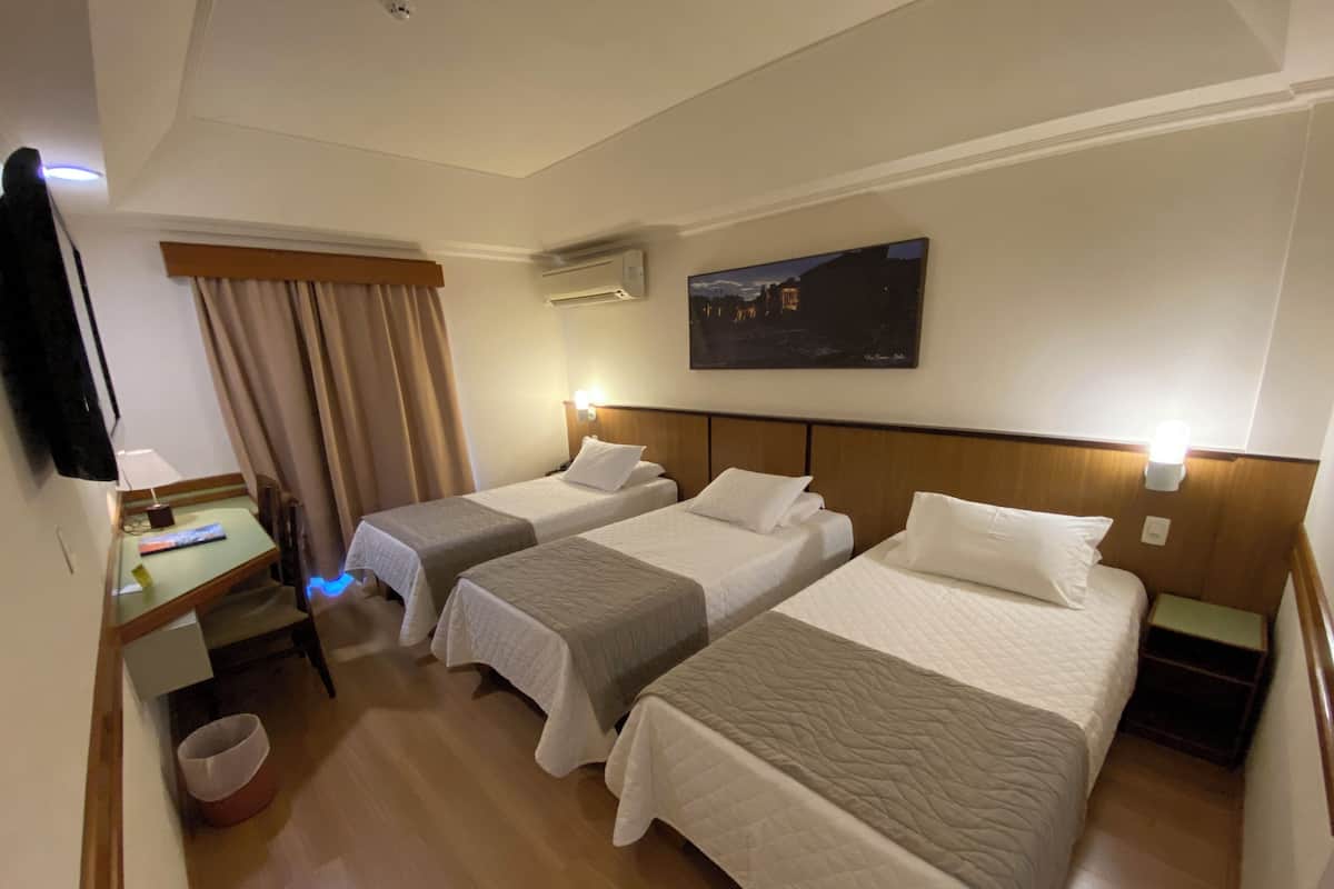 Deluxe Triple Room | 1 bedroom, minibar, in-room safe, desk