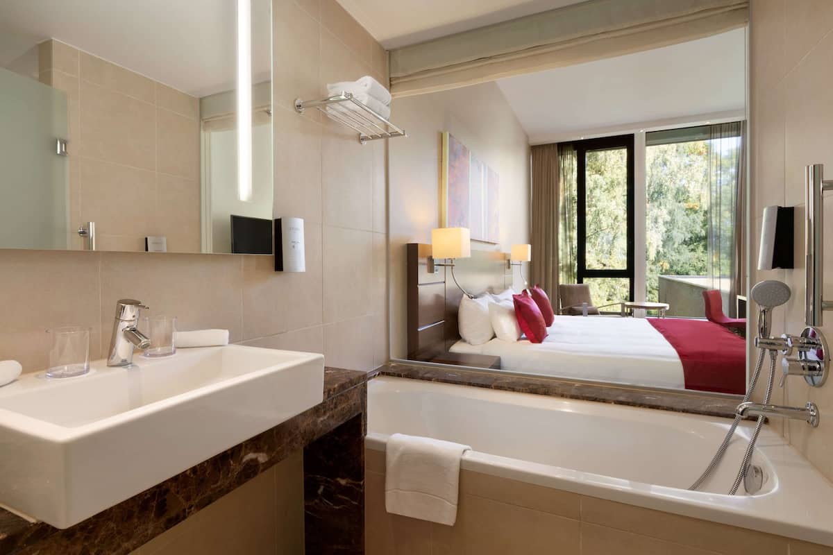 deluxe room | bathroom | eco-friendly toiletries, hair dryer, bathrobes, slippers