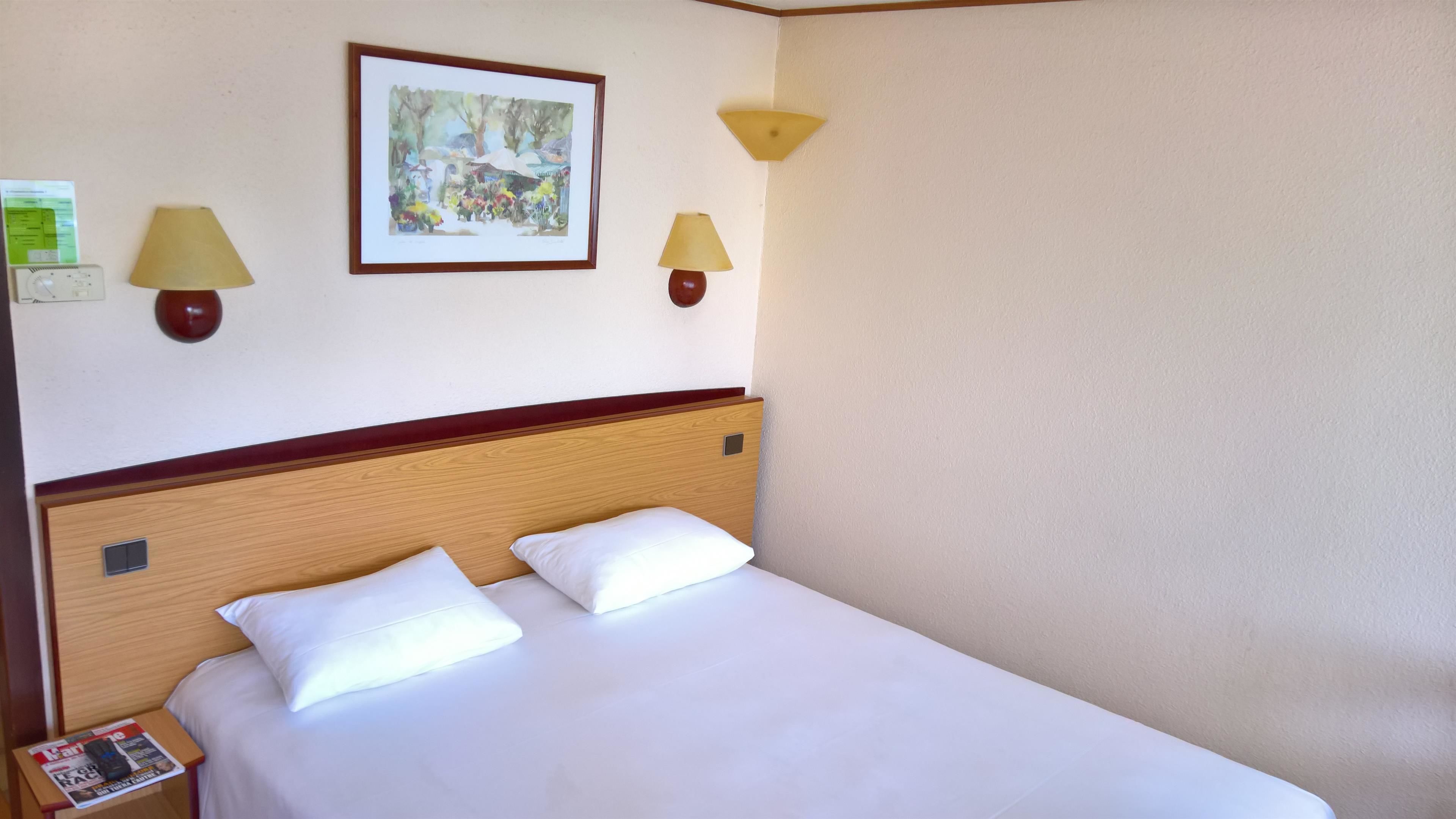 Premium bedding, desk, blackout drapes, iron/ironing board