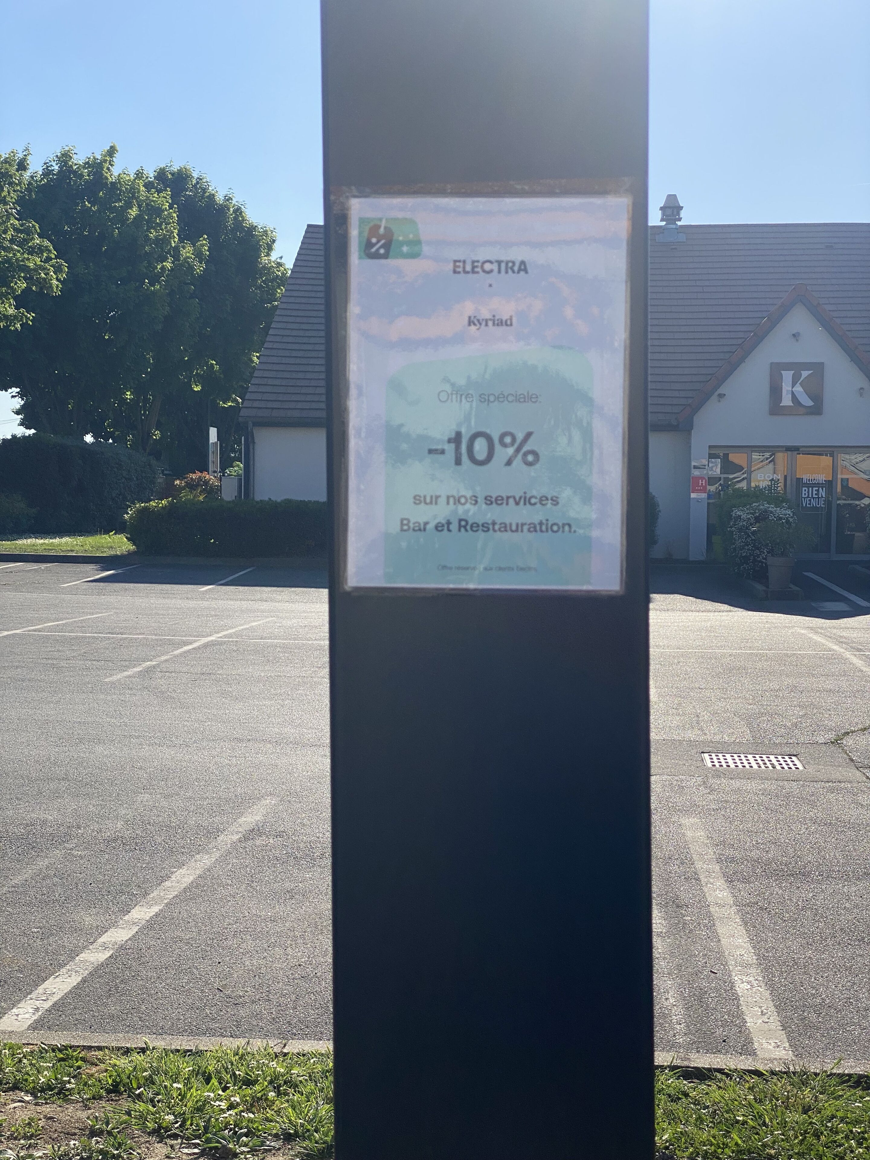 A signboard advertising a special offer of 10% off at a restaurant.