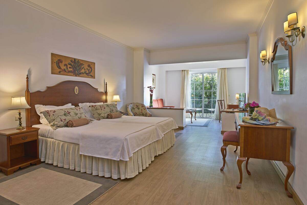 premium double or twin room, balcony, garden view | 1 bedroom, free minibar items, in-room safe, desk