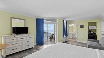 Partial Ocean View King Room | Desk, iron/ironing board, WiFi (free), individually decorated
