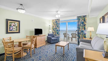 Oceanfront Deluxe One Bedroom Condo | Living area | TV