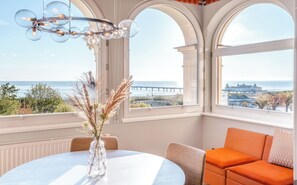 One-Bedroom Apartment - Sea View (Fire Safety Window in bedroom, cannot be opened) | Living area | 40-inch flat-screen TV with satellite channels, TV, fireplace - Das Ahlbeck Hotel & Spa (Heringsdorf)