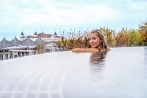 Indoor pool, outdoor pool, open 7:00 AM to 10:00 PM, pool loungers